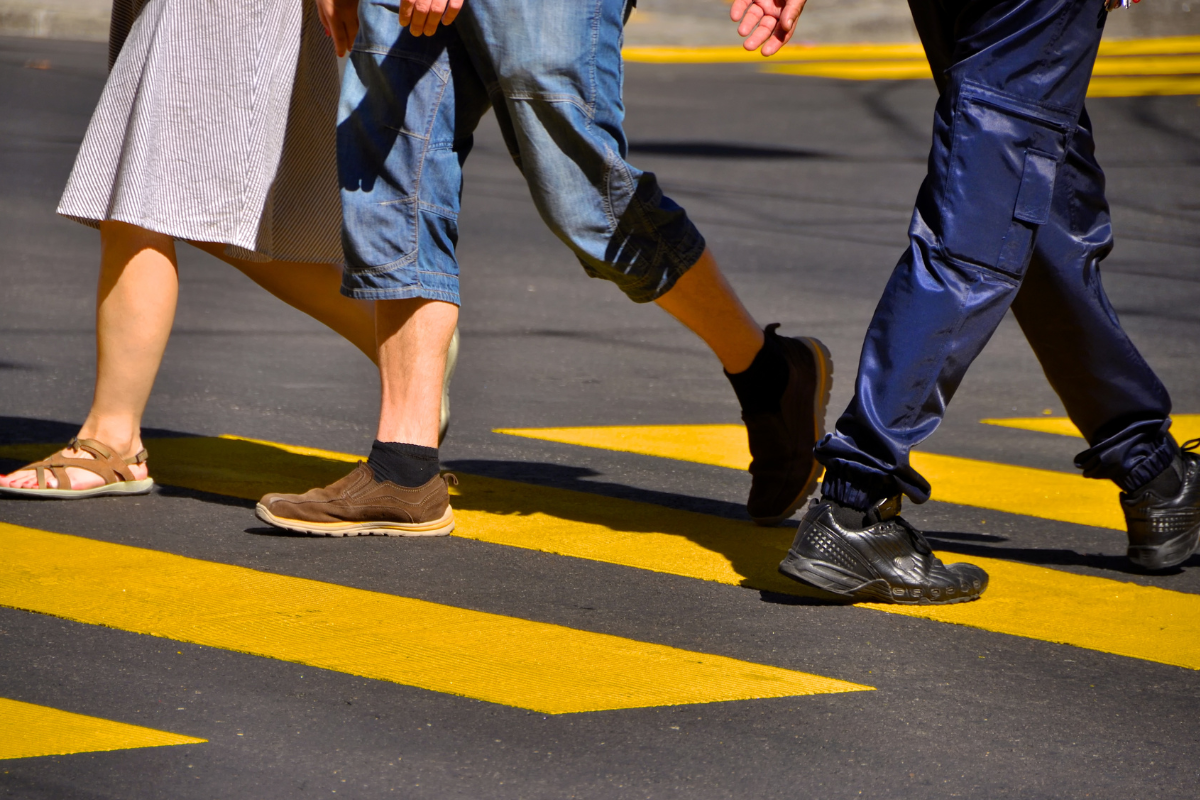An image of a people crossing on a pedestrian lane